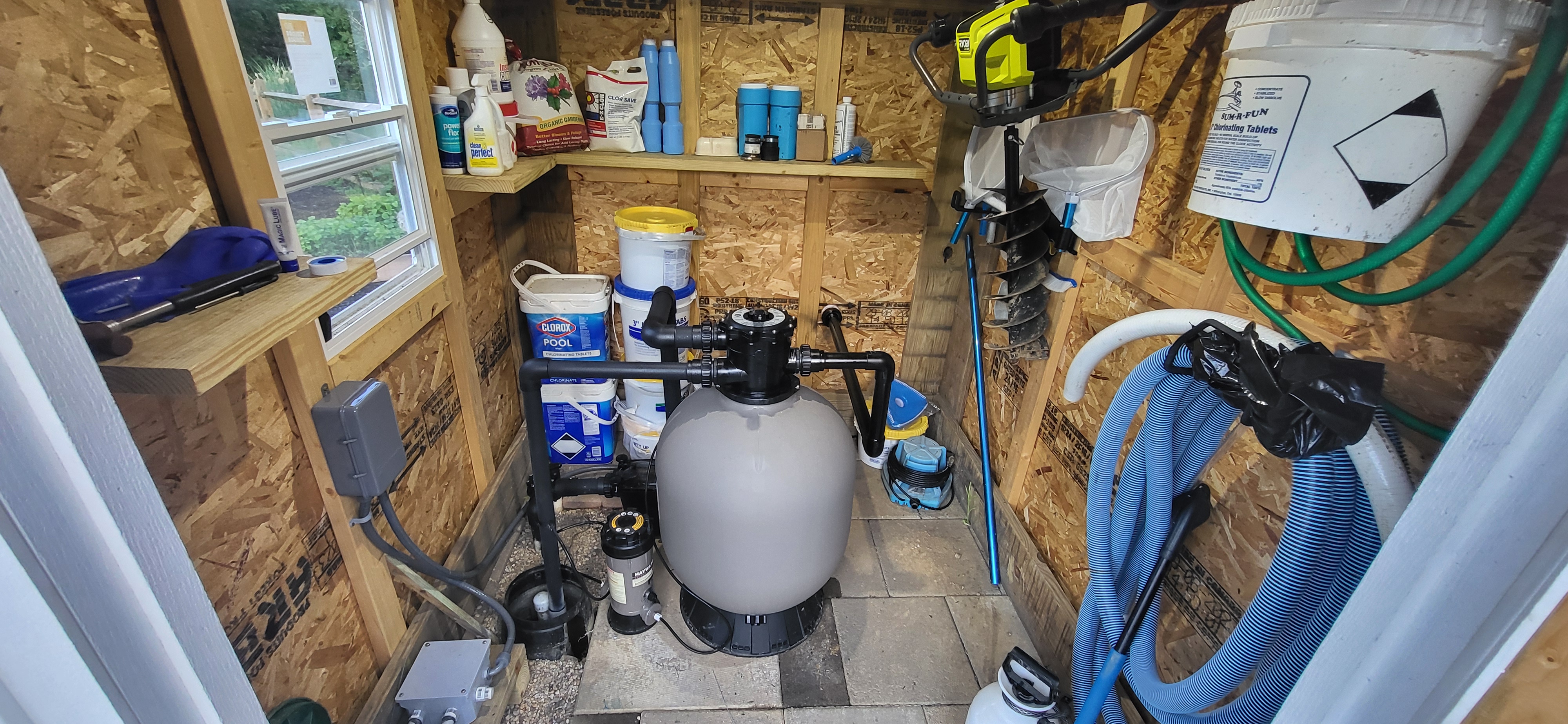 Pool equipment in shed